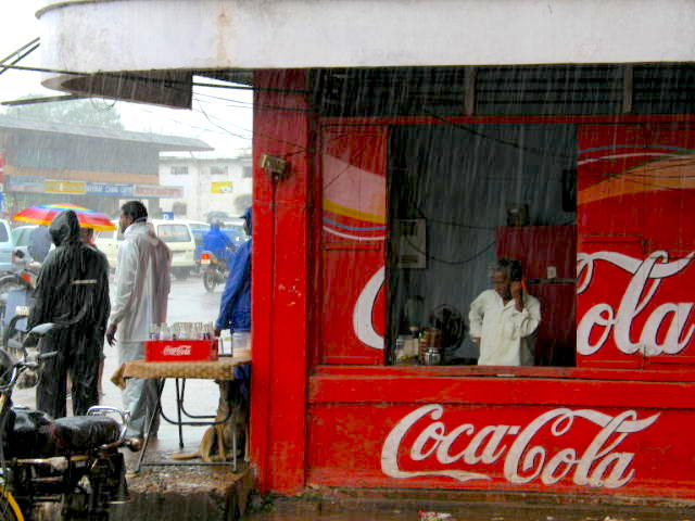 Rain suits, umbrellas, Coke, and phones--what's not to love