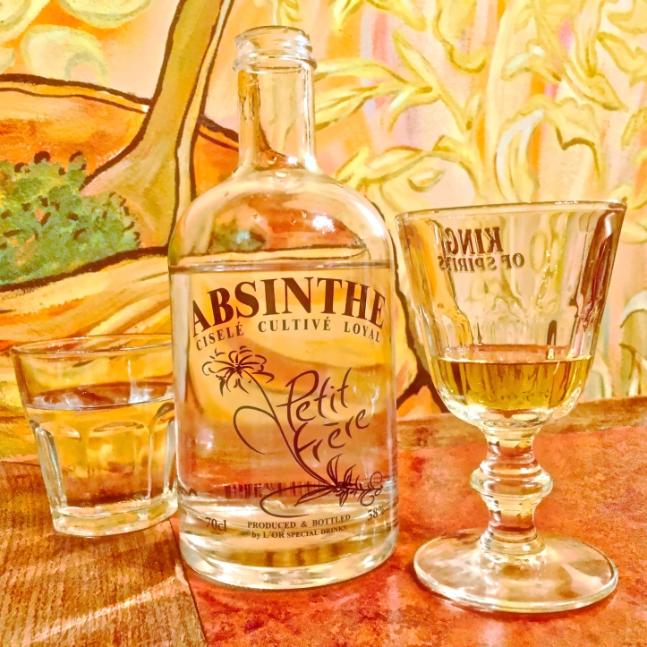 absinthe glass with water bottle
