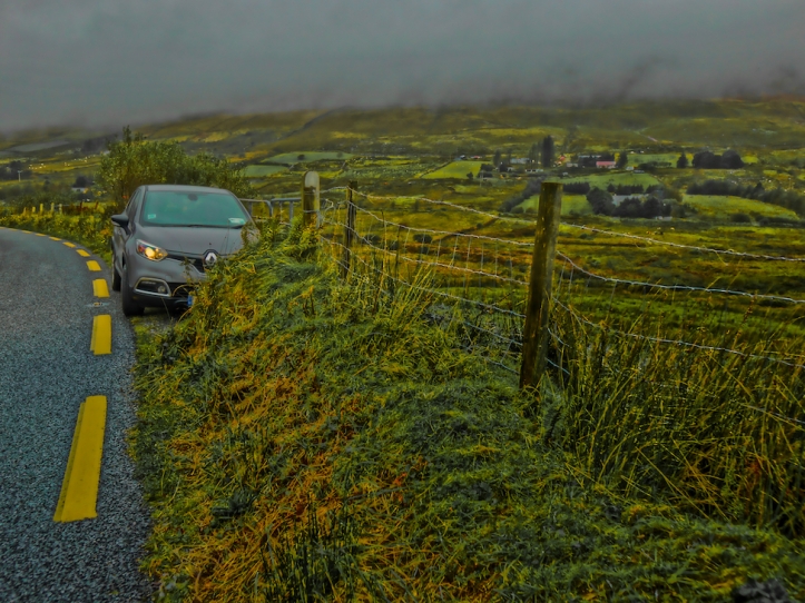 Irish road w/rain, grasslands
